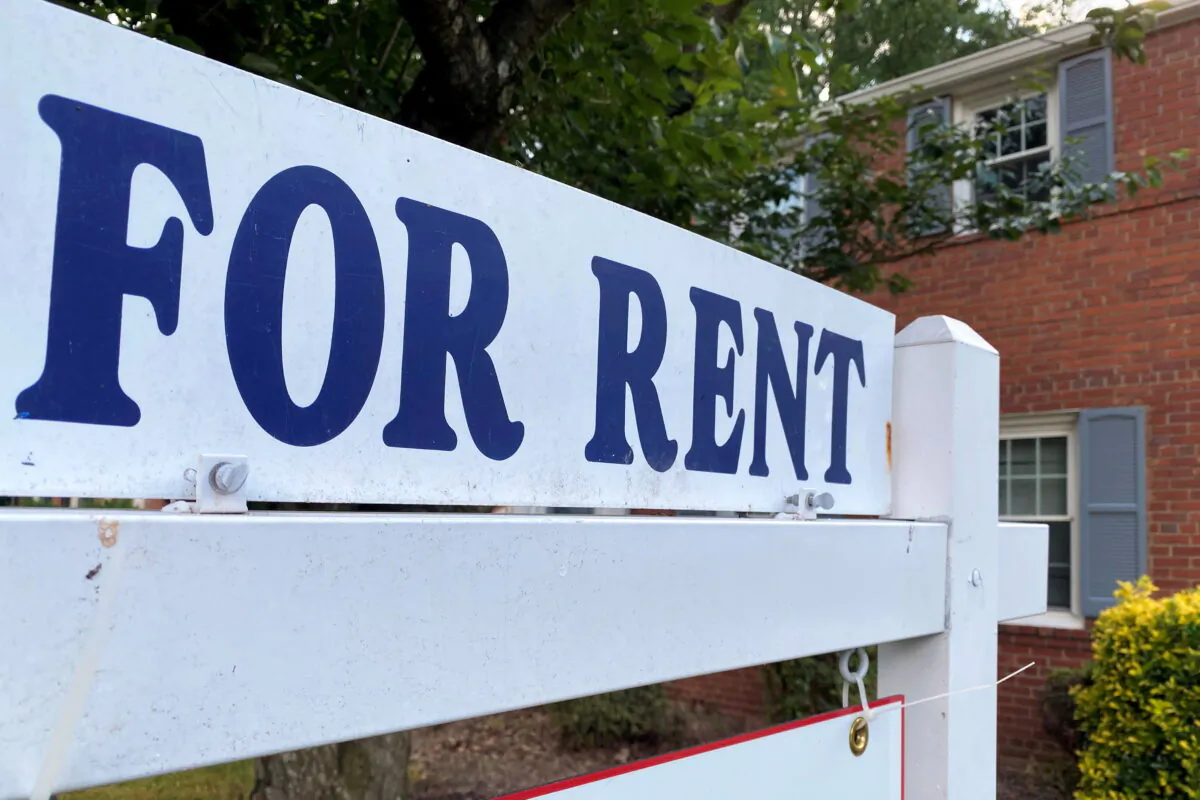 A "For Rent" sign is placed in front of a home in Arlington, Va., on June 8, 2021. (Will Dunham/File Photo/Reuters)
