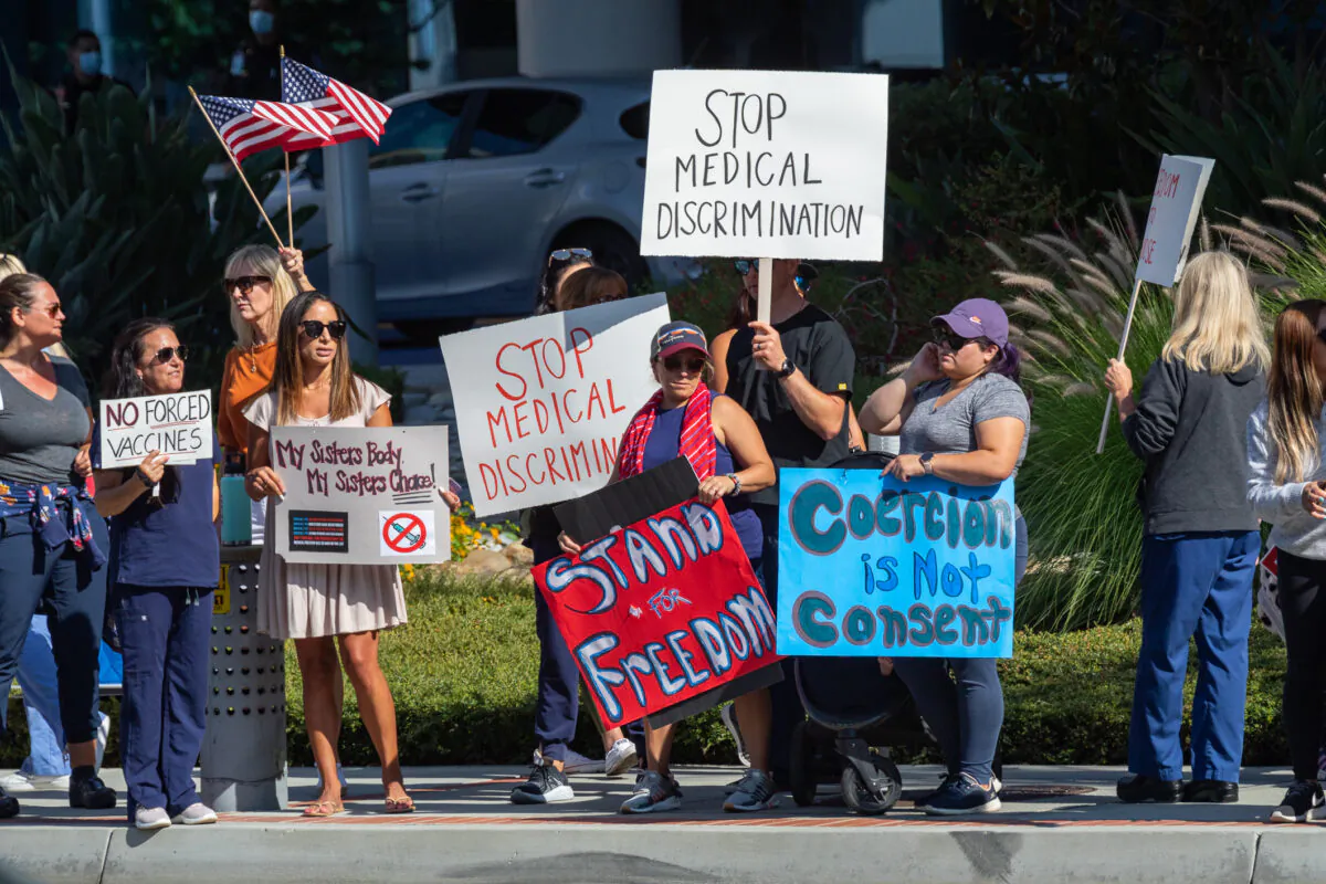 Medical personnel protest manditory vaccines in Orange, Calif., on Aug. 9, 2021. (John Fredricks/The Epoch Times)