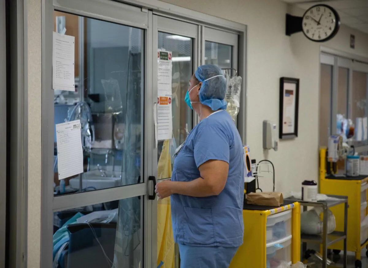 A health care professional prepares to enter a COVID-19 patient's room in the ICU at Van Wert County Hospital in Van Wert, Ohio, on Nov. 20, 2020. (Megan Jelinger/AFP via Getty Images)