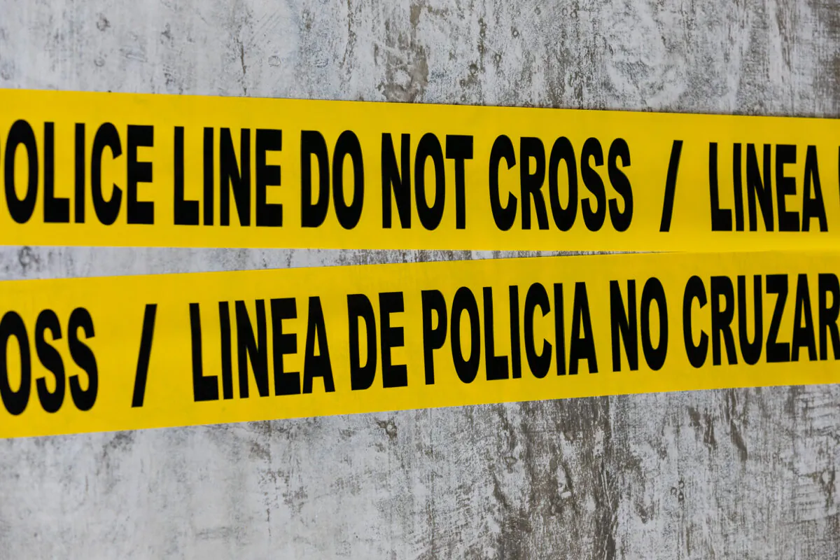 Crime scene tape in Santa Ana, Calif., on March 11, 2021. (John Fredricks/The Epoch Times)