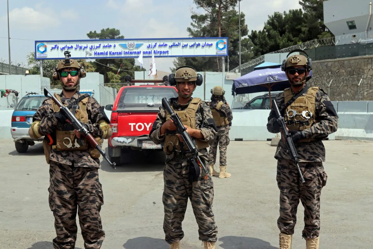 Taliban terrorists stand guard outside the Hamid Karzai International Airport after the U.S. military's withdrawal, in Kabul, Afghanistan, on Aug. 31, 2021. (Khwaja Tawfiq Sediqi/AP Photo)