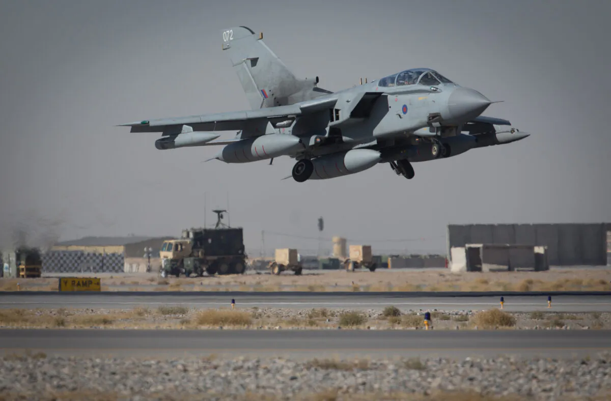 A Tornado from RAF Marham's 31 Squadron takes off from Kandahar airfield, completing the Squadron's final deployment to Afghanistan, on Nov. 11, 2014. (Matt Cardy/Getty Images)