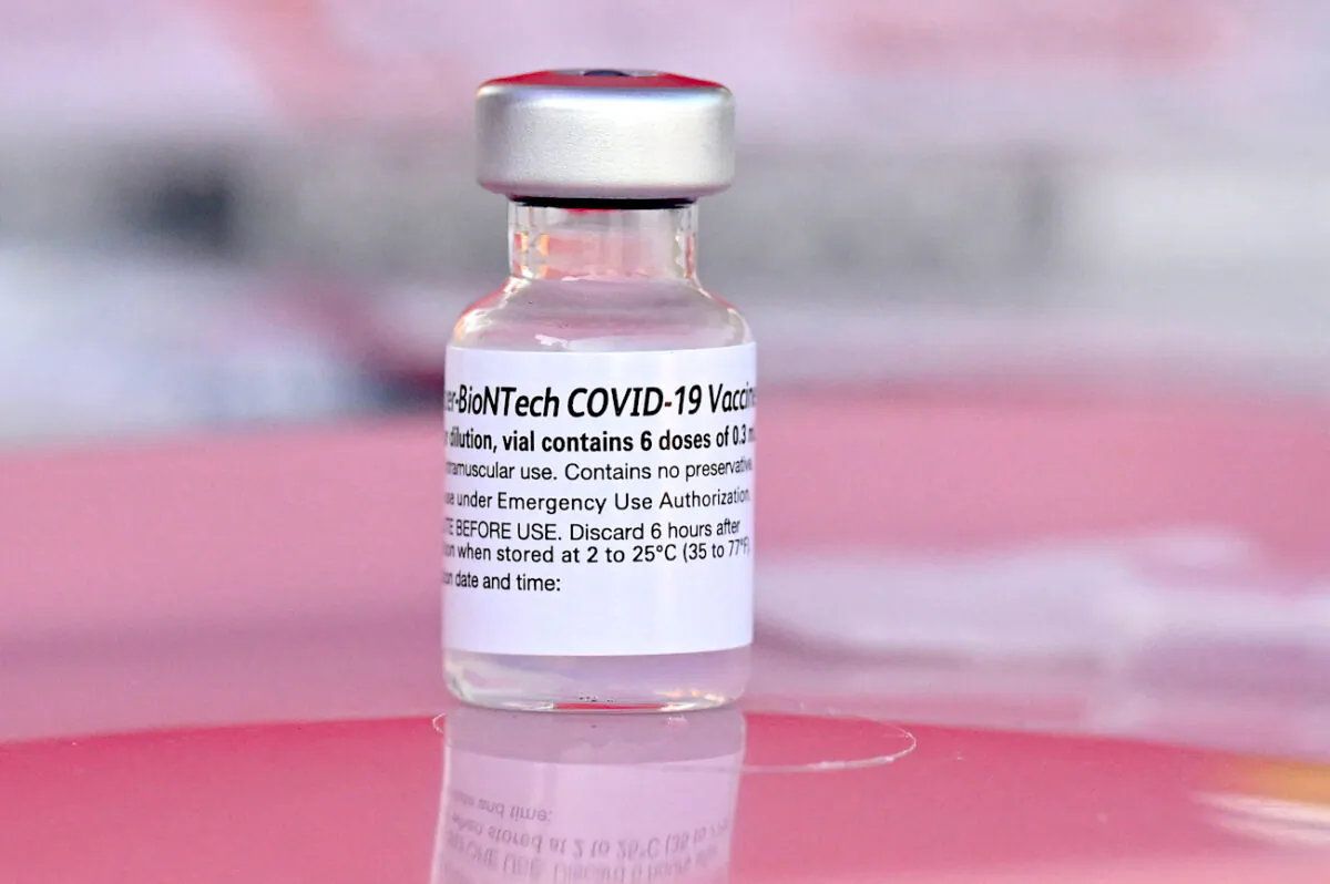 A vial of Pfizer–BioNTech COVID-19 vaccine is seen at a pop up vaccine clinic in the Arleta neighborhood of Los Angeles, California, Aug. 23, 2021. (Robyn Beck/AFP via Getty Images)