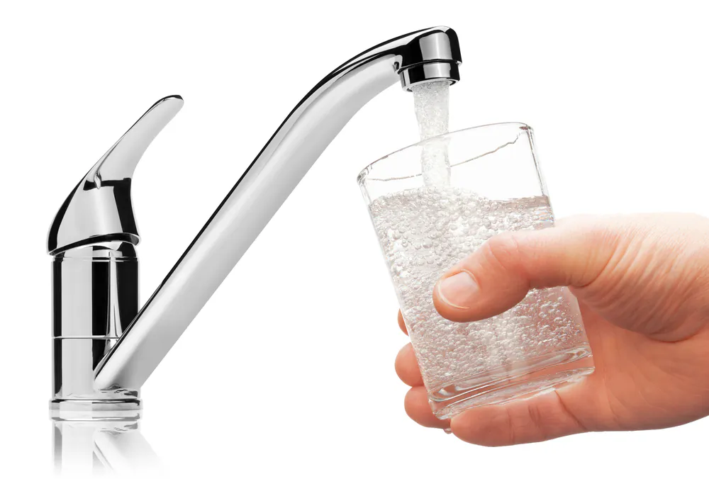 The next time you feel thirsty, don't reach for a bottle. Instead, turn on the tap. (Yuri Samsonov/Shutterstock)