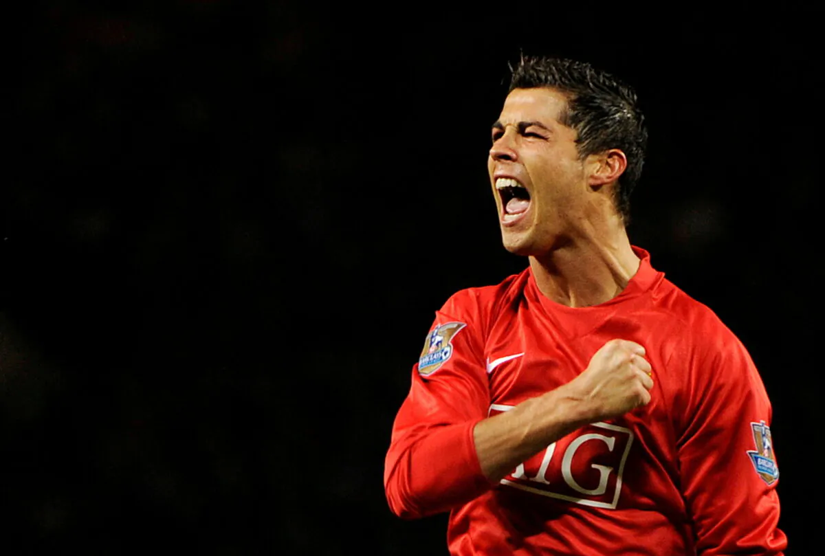 Manchester United's Cristiano Ronaldo celebrates after scoring their first goal during the English Premier league soccer match against West Ham United at Old Trafford, Manchester, UK, on Oct. 29, 2008. (Toby Melville/Reuters)