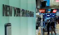 Stocks End With Tiny Gains, Enough to Nudge Nasdaq to Record