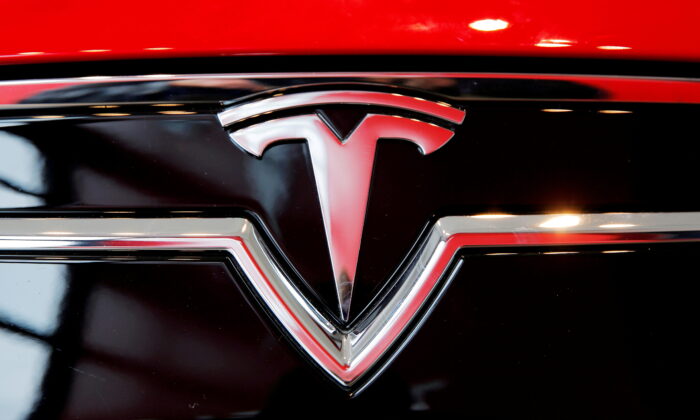 A Tesla logo on a Model S is seen at a Tesla dealership in New York on April 29, 2016. (Lucas Jackson/Reuters)