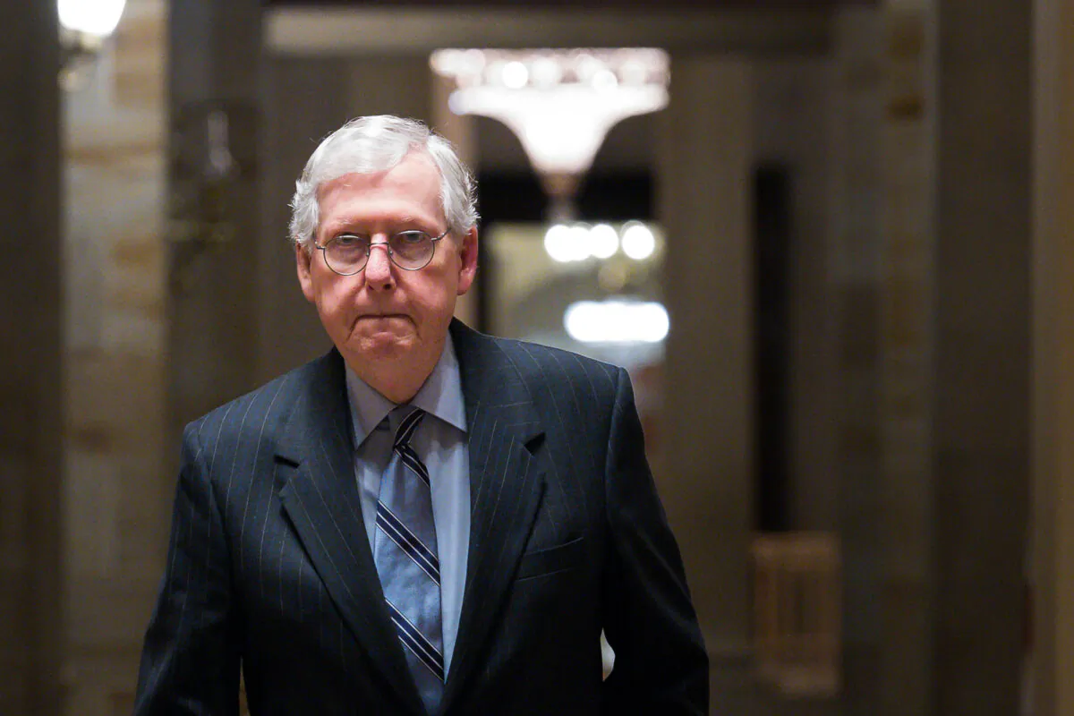 Senate Minority Leader Mitch McConnell (R-Ky.) heads toward the Senate Chamber in the U.S. Capitol in Washington on Aug. 11, 2021. (Liz Lynch/Getty Images)