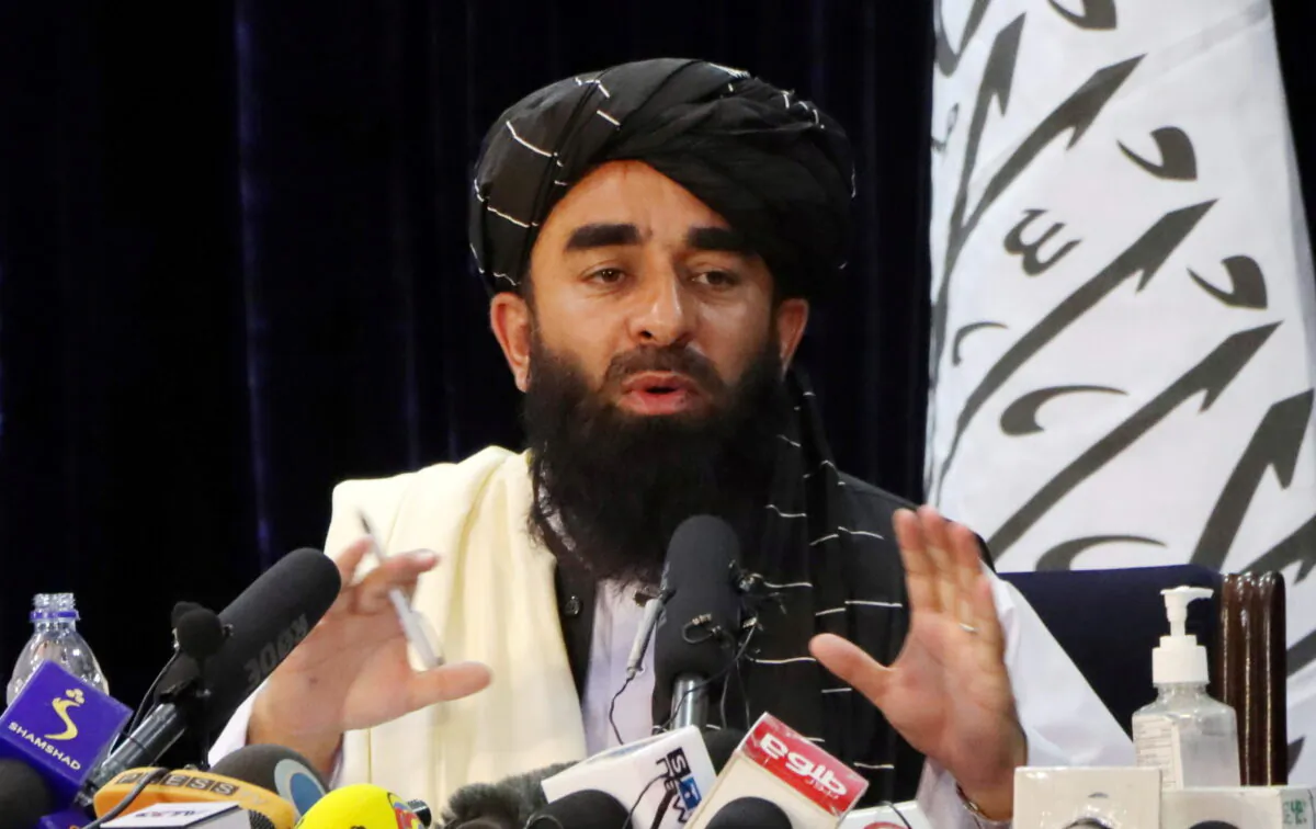 Taliban spokesman Zabihullah Mujahid speaks during a news conference in Kabul, Afghanistan, on Aug. 17, 2021. (Stringer/Reuters)