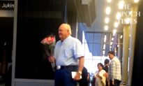 Gentleman Waits for His Wife With Flowers and Chocolates