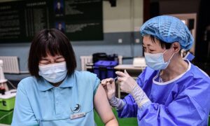 Chinese COVID-19 Vaccines Under Spotlight After Woman Censored for Posting About Death Following Sinopharm Shot