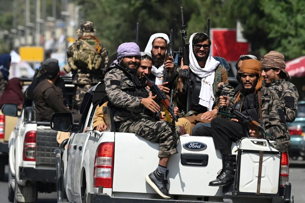 A convoy of Taliban fighters patrol along a street in Kabul on Sept. 2, 2021. (Aamir Qureshi/AFP via Getty Images)