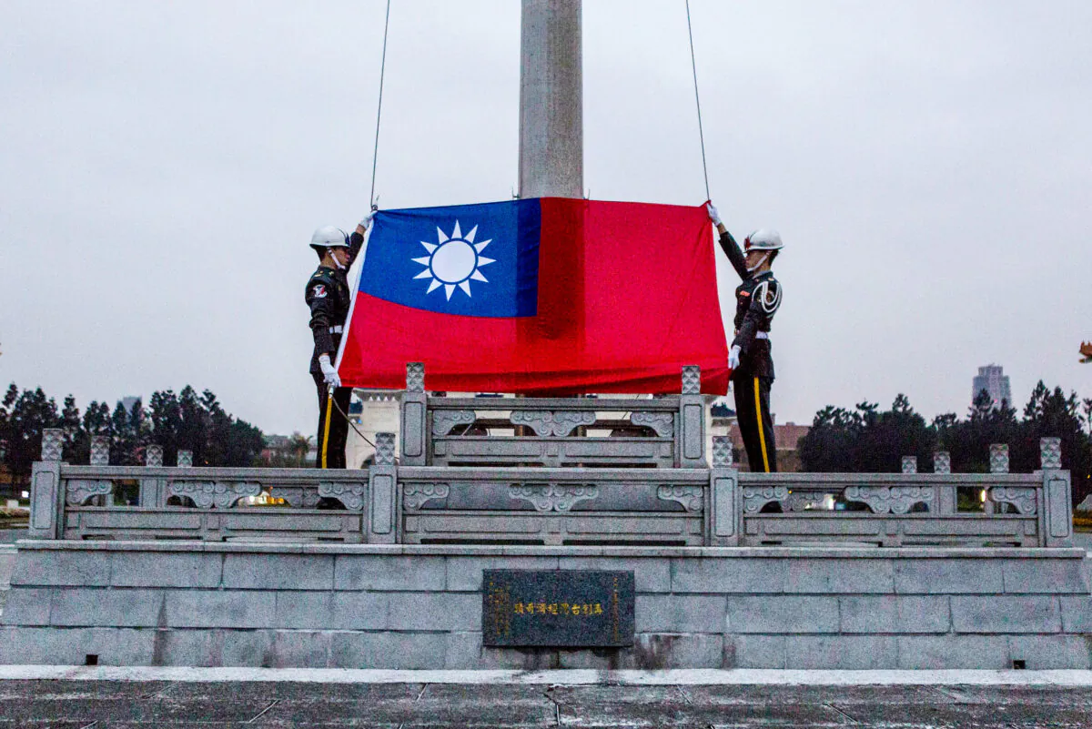 Honor guards prepare to raise the Taiwan flag in the Chiang Kai-shek Memorial Hall square in Taipei, Taiwan, on Jan. 14, 2016. (Ulet Ifansasti/Getty Images)