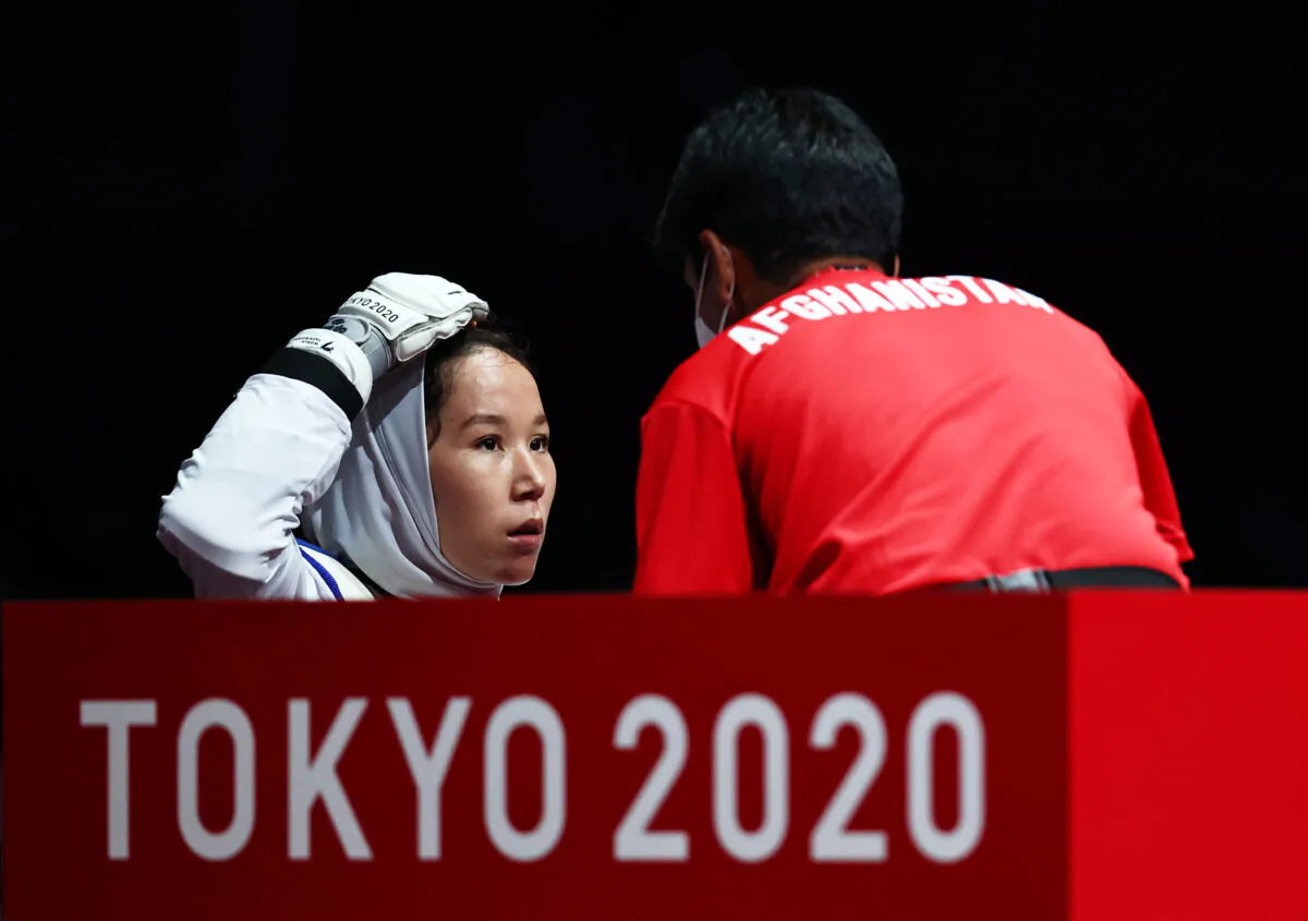 Zakia Khudadadi of Afghanistan during her bout against Viktoriia Marchuk of Ukraine at Tokyo 2020 Paralympic Games in Chiba, Japan, on Sept. 2, 2021. (Thomas Peter/Reuters)