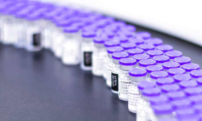Vials of the Pfizer-BioNTech COVID-19 vaccine are prepared for packaging astatine  Pfizer's installation  successful  Puurs, Belgium, March 2021. (Pfizer via AP)