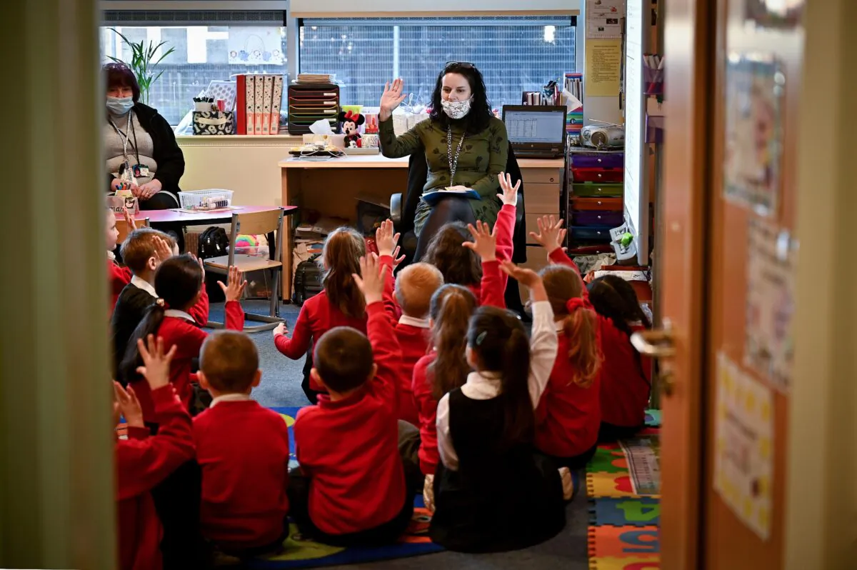 Pupils return to the classroom at Cleeves Primary School, in Glasgow, Scotland, on Feb. 22, 2021. (Jeff J Mitchell/Getty Images)