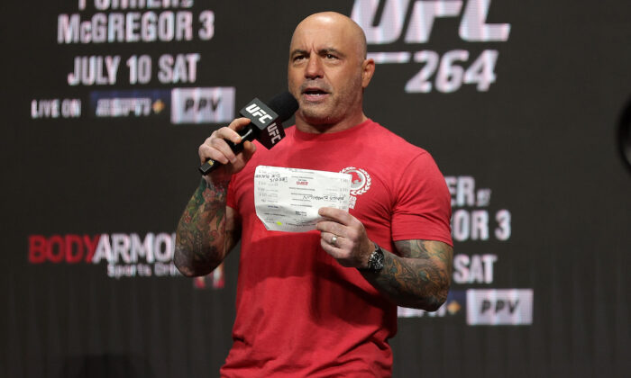 Joe Rogan at a ceremonial weigh in for UFC 264 at T-Mobile Arena in Las Vegas, Nev., on July 9, 2021. (Stacy Revere/Getty Images)