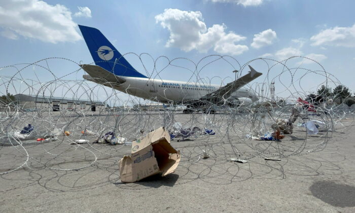 A commercial airplane is seen at the Hamid Karzai International Airport a day after U.S. troops' withdrawal in Kabul, Afghanistan, on Aug. 31, 2021. (Stringer/Reuters)