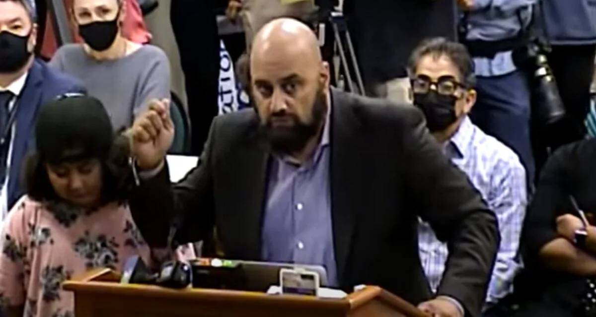 A man speaks during a Natomas Unified School District board meeting regarding a teacher who allegedly taught his students to become leftist revolutionaries. (Natomas Unified School District/Screenshot via The Epoch Times)