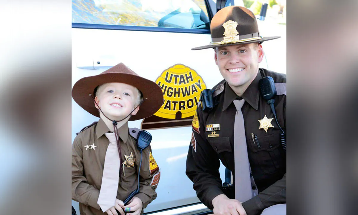Sgt. Chamberlin Neff of the Utah Highway Patrol with Coleman Ross. (Courtesy of Utah Highway Patrol)