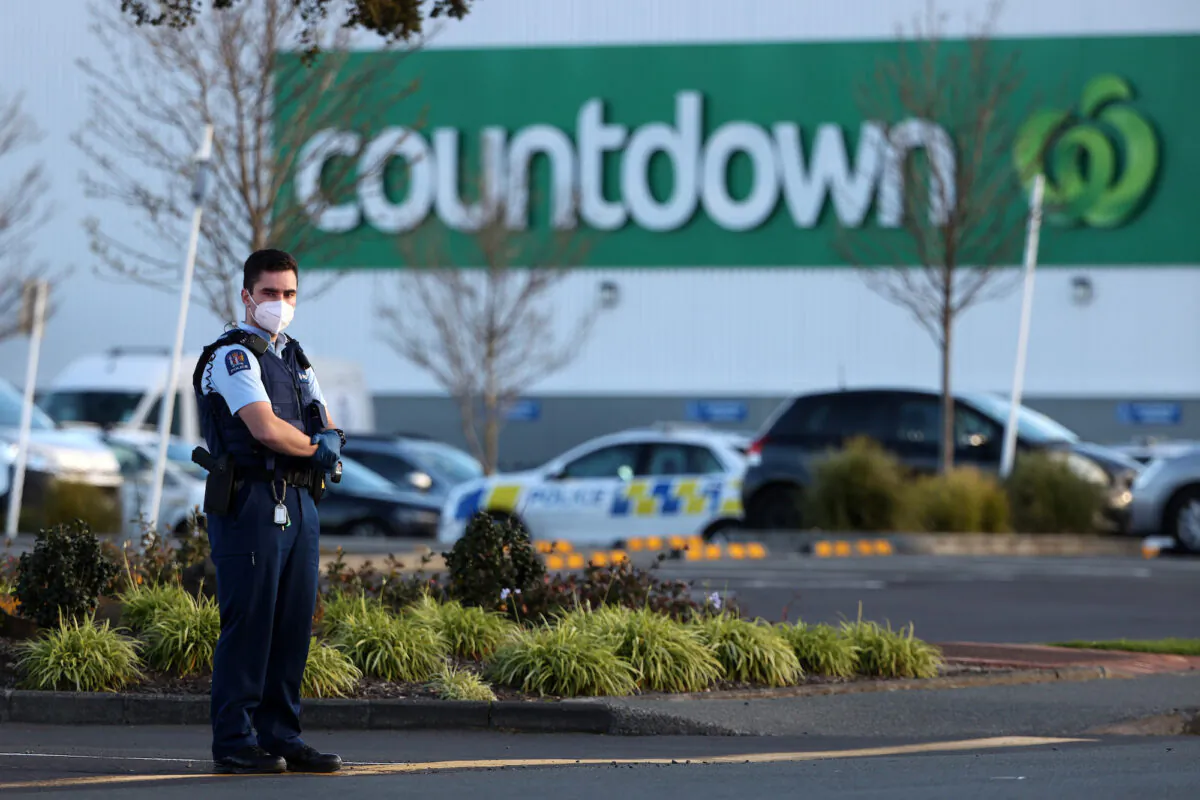 Armed police patrol the area around Countdown LynnMall after a mass stabbing incident in Auckland, New Zealand, on Sept. 3, 2021. (Fiona Goodall/Getty Images)
