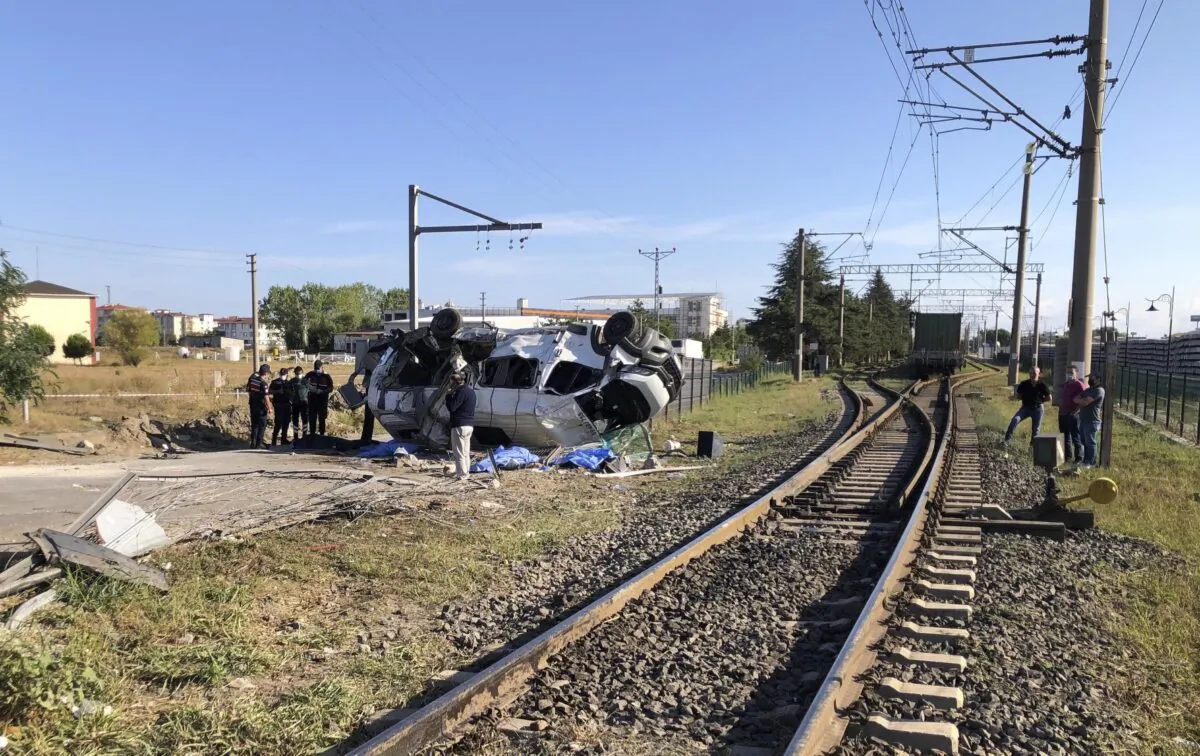 Security officers investigate the crash site in Ergene, Tekirdag Province, Turkey, on Sept. 4, 2021. (IHA via AP)