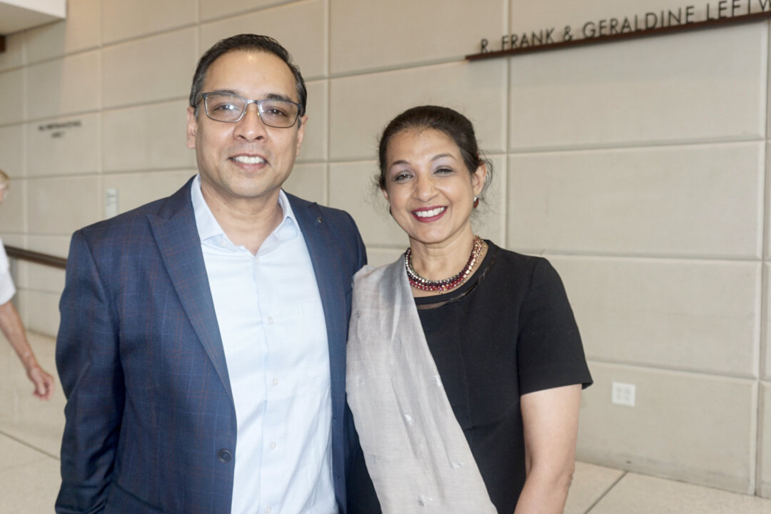 Sherman Crabal and Swati Hede enjoy Shen Yun Performing Arts at the Eisemann Center, Richardson City, in Texas, on Sept. 4, 2021. (Yawen Hung/The Epoch Times)