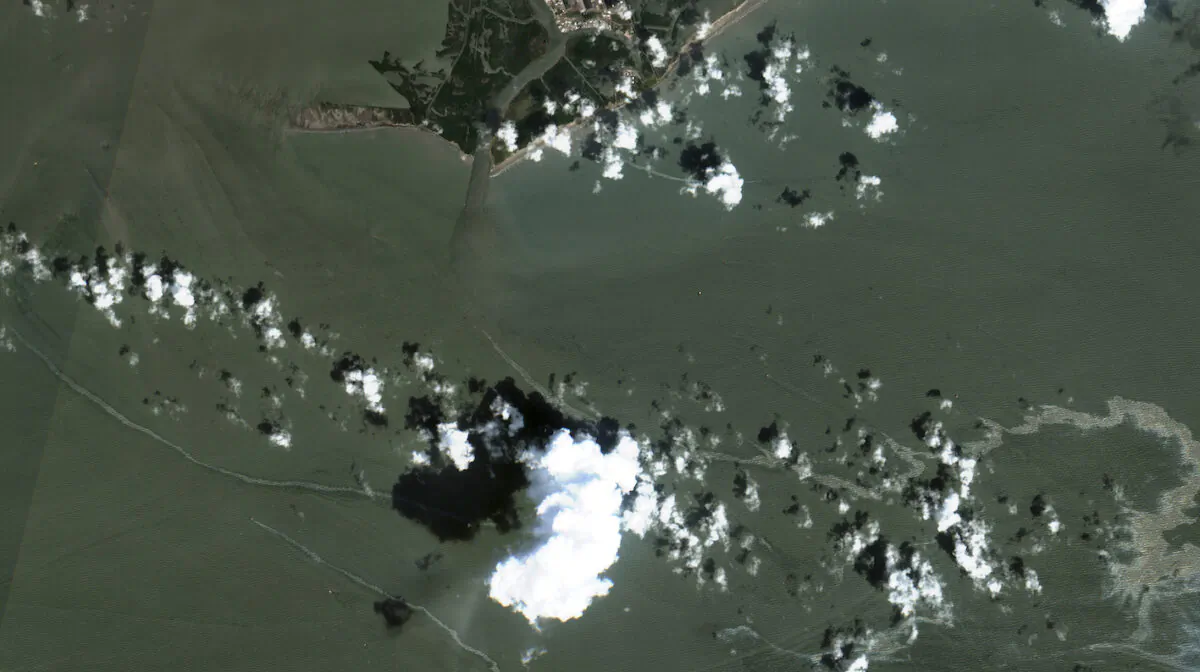 An oil slick seen south of Port Fourchon, La., on Sept. 2, 2021. The U.S. Coast Guard said Sept. 4, that cleanup crews are responding to a sizable oil spill in the Gulf of Mexico following Hurricane Ida. (Maxar Technologies via AP)