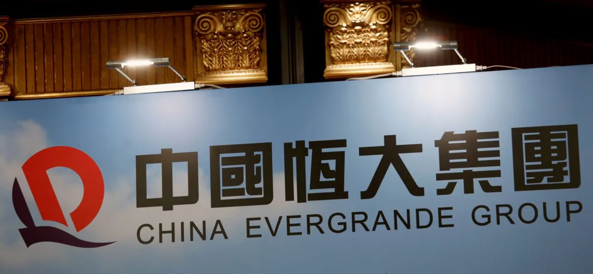 A logo of China Evergrande Group is displayed at a news conference on the property developer's annual results in Hong Kong, China on March 28, 2017. (Bobby Yip/Reuters)