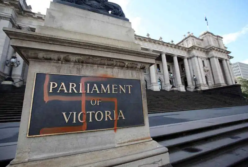 A Nazi swastika is seen graffitied on the front of the Victorian State Parliament, in Melbourne, Australia, on Oct. 1, 2012 (AAP Image/David Crosling)