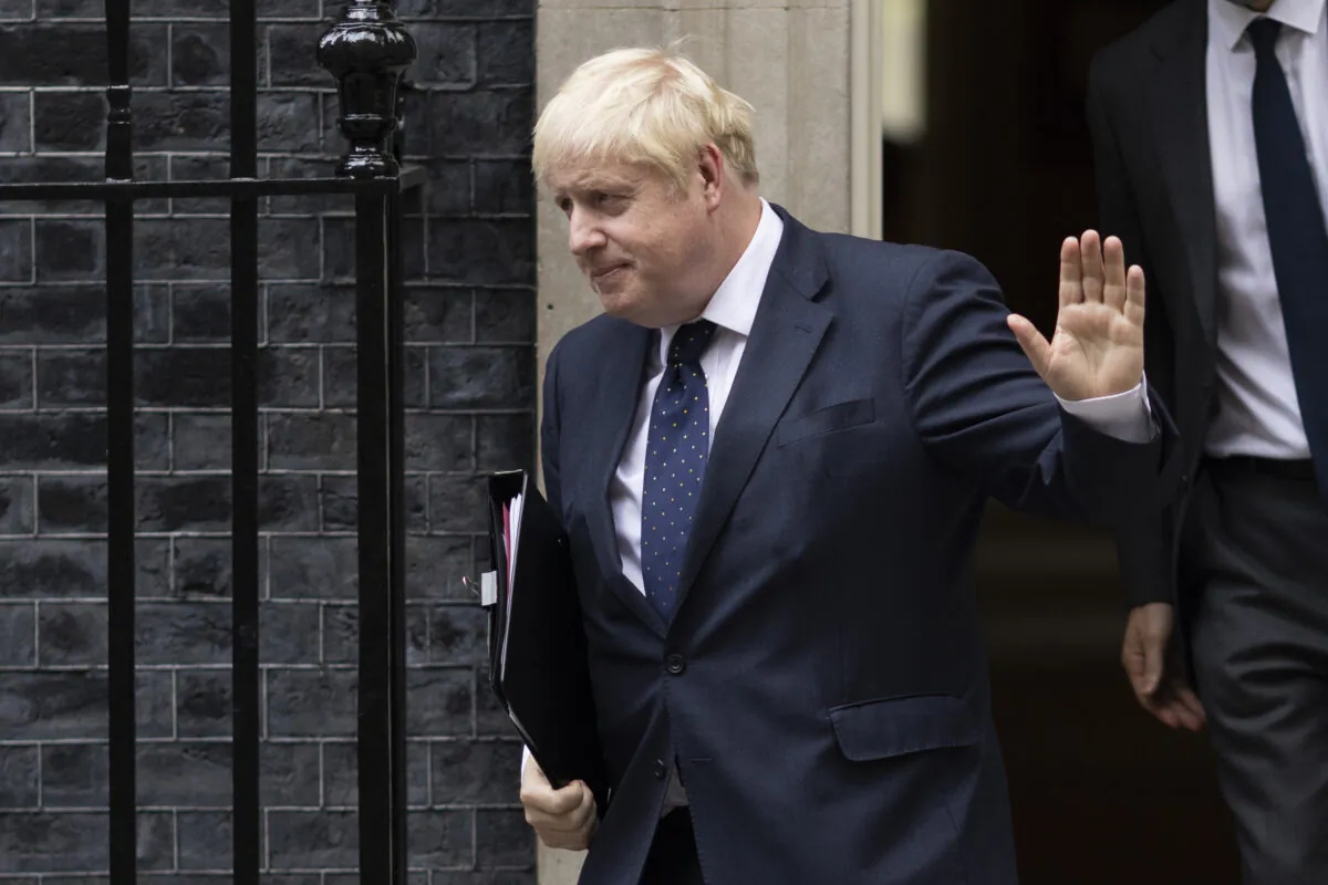 British Prime Minister Boris Johnson leaves 10 Downing Street to deliver a statement on Afghanistan in the House of Commons, in London on Sept. 6, 2021. (Dan Kitwood/Getty Images)