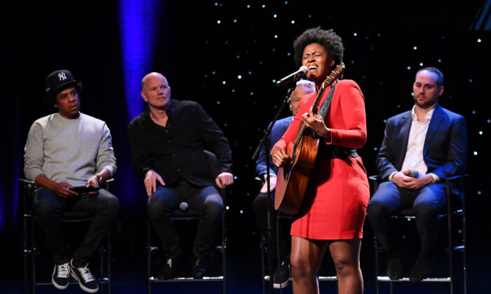 Victory Boyd performs onstage for Shawn "Jay-Z" Carter, Michael Novogratz, Robert Kraft and Michael Rubin during the launch of The Reform Alliance at John Jay College in New York City on Jan. 23, 2019.  (Nicholas Hunt/Getty Images for The Reform Alliance)