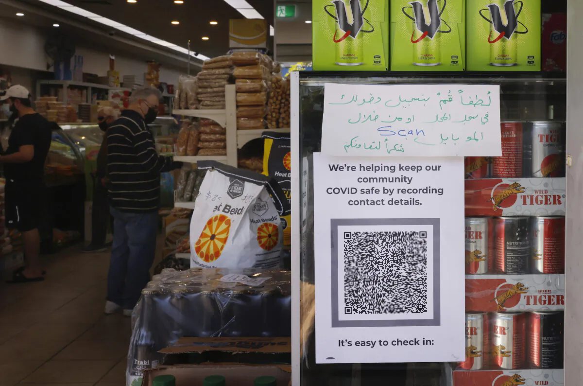 A QR code check in is seen at a supermarket in Fairfield in Sydney, Australia, on July 18, 2021. (Jenny Evans/Getty Images)
