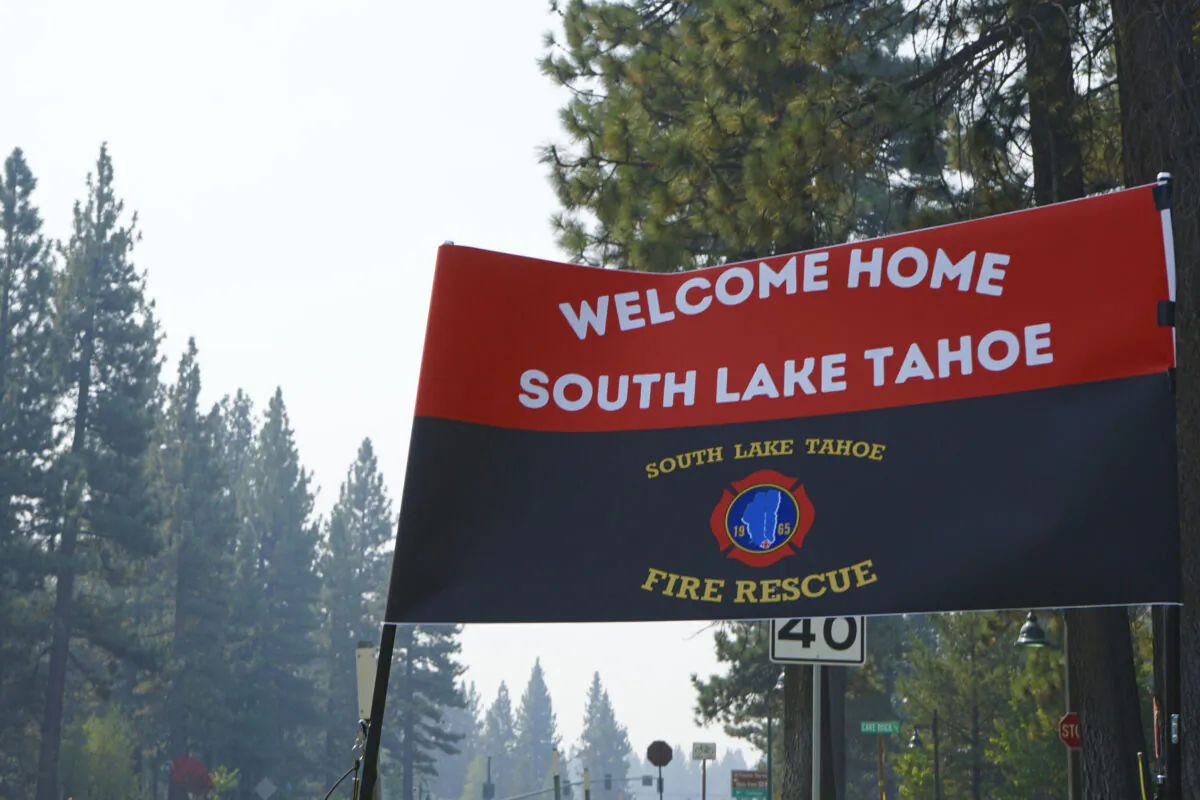 A sign outside a Fire Station welcomes residents back to town after the lifting of the evacuation order at South Lake Tahoe, Calif., on Sept. 6, 2021. (Samuel Metz/AP Photo)