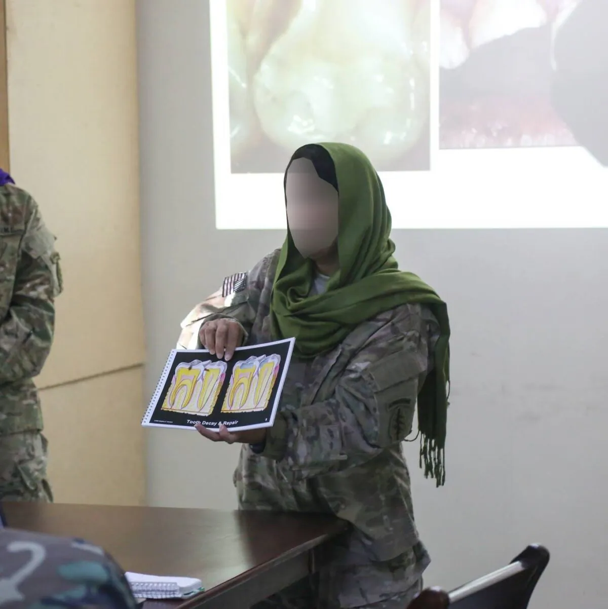 The interpreter at work in Afghanistan. (Courtesy of the interpreter)