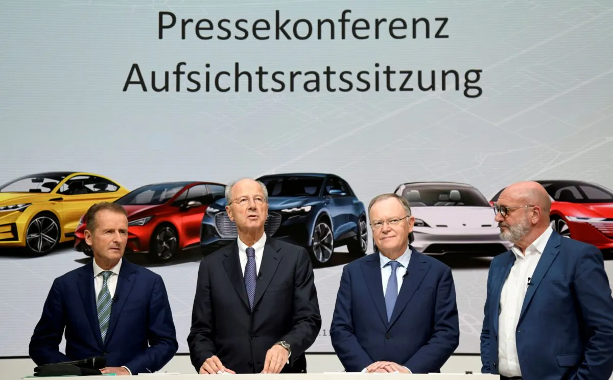 Volkswagen CEO, Herbert Diess, chairman of the supervisory board Hans Dieter Poetsch, Lower Saxony's Prime Minister Stephan Weil and head of VW works council, Bernd Osterloh, address the media after a supervisory board meeting at the Volkswagen plant in Wolfsburg, Germany on Nov. 15, 2019. (Fabian Bimmer/Reuters)