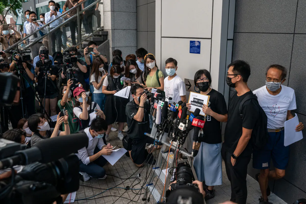 Hong Kong Alliance in Support of Patriotic Democratic Movements of China vice-chairwoman Tonyee Chow Hang-tung speaks to members of the media outside police headquarters in response to the National Security Department's request on allegations of foreign agents in Hong Kong, China, on Sept. 7, 2021. (Anthony Kwan/Getty Images)