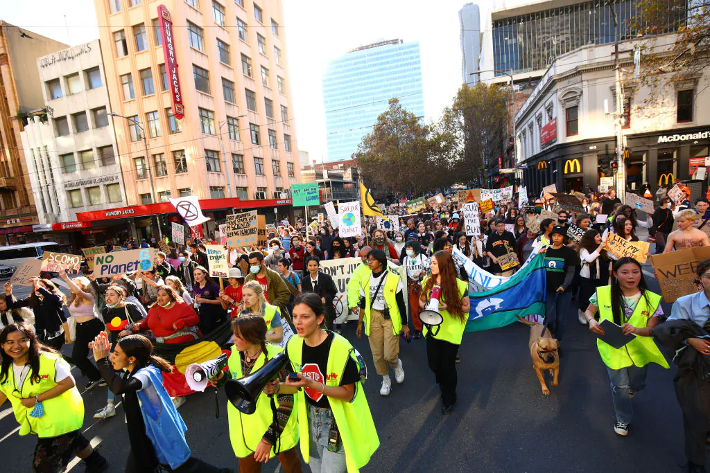 Protesters take part in the School Strike 4 Climate rally on in Melbourne, Australia, on May 21, 2021. (Graham Denholm/Getty Images)