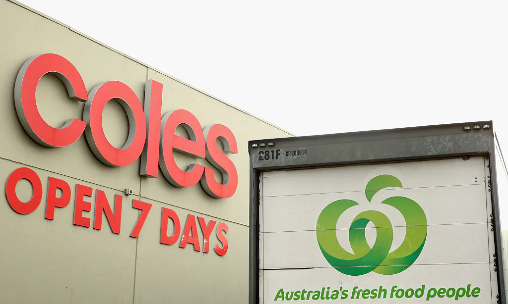 A Woolworths truck is parked outside a Coles Supermarket in Melbourne, Australia, on May 25, 2015. (Quinn Rooney/Getty Images)