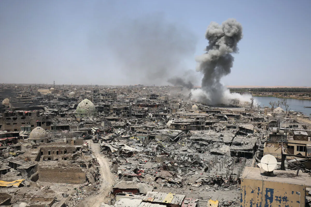 Smoke billows following an airstrike by U.S.-led international coalition forces targeting the ISIS terror group in Mosul, Iraq, on July 9, 2017. (Ahmad Al-Rubaye/AFP via Getty Images)