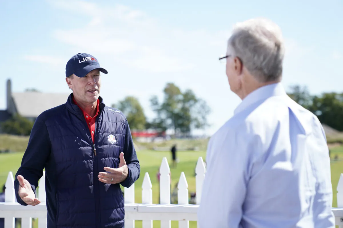 U.S. Ryder Cup captain Steve Stricker speaks with Golf Channel analysis Mark Rolfing during an interview after the 43rd Ryder Cup Captain's Picks Press Conference at Whistling Straits in Kohler, Wis., on Sept. 8, 2021. (Patrick McDermott/Getty Images)
