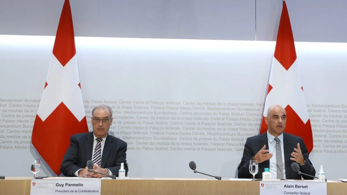 Swiss Interior and Health Minister Alain Berset (R) and Guy Parmelin President of the Swiss Confederation attend a news conference on the outbreak of COVID-19 in Bern, Switzerland, on Sept. 8, 2021. (Denis Balibouse/Reuters)