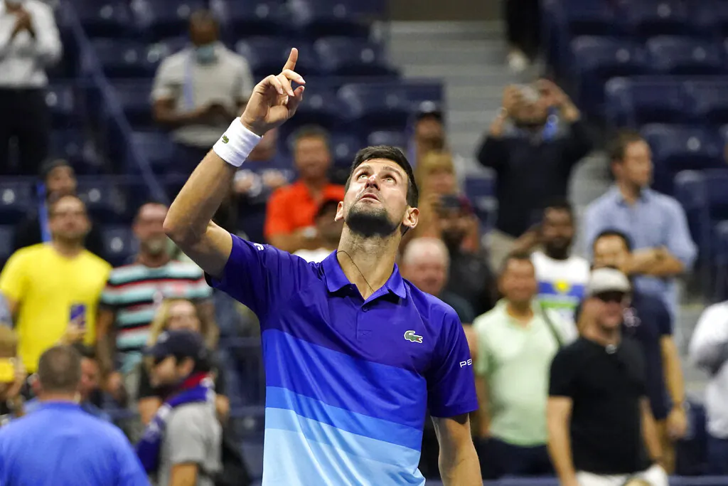 Novak Djokovic of Serbia motions and looks up after defeating Matteo Berrettini of Italy during the quarterfinals of the U.S. Open tennis tournament in New York, on Sept. 9, 2021. (Frank Franklin II/AP Photo)