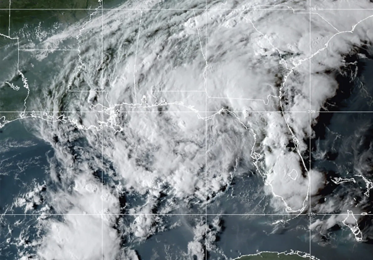 Tropical Storm Mindy as it makes landfall on the Florida Panhandle in this GOES- East GeoColor satellite image taken on Sept. 8, 2021, at 10:30 p.m. ET. (NOAA via AP)