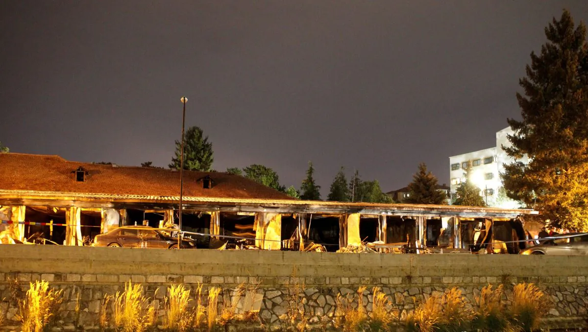 A burned out makeshift hospital stands after a fire in North Macedonia's northwestern city of Tetovo, early Thursday, Sept. 9, 2021. (Boris Grdanoski/AP Photo)