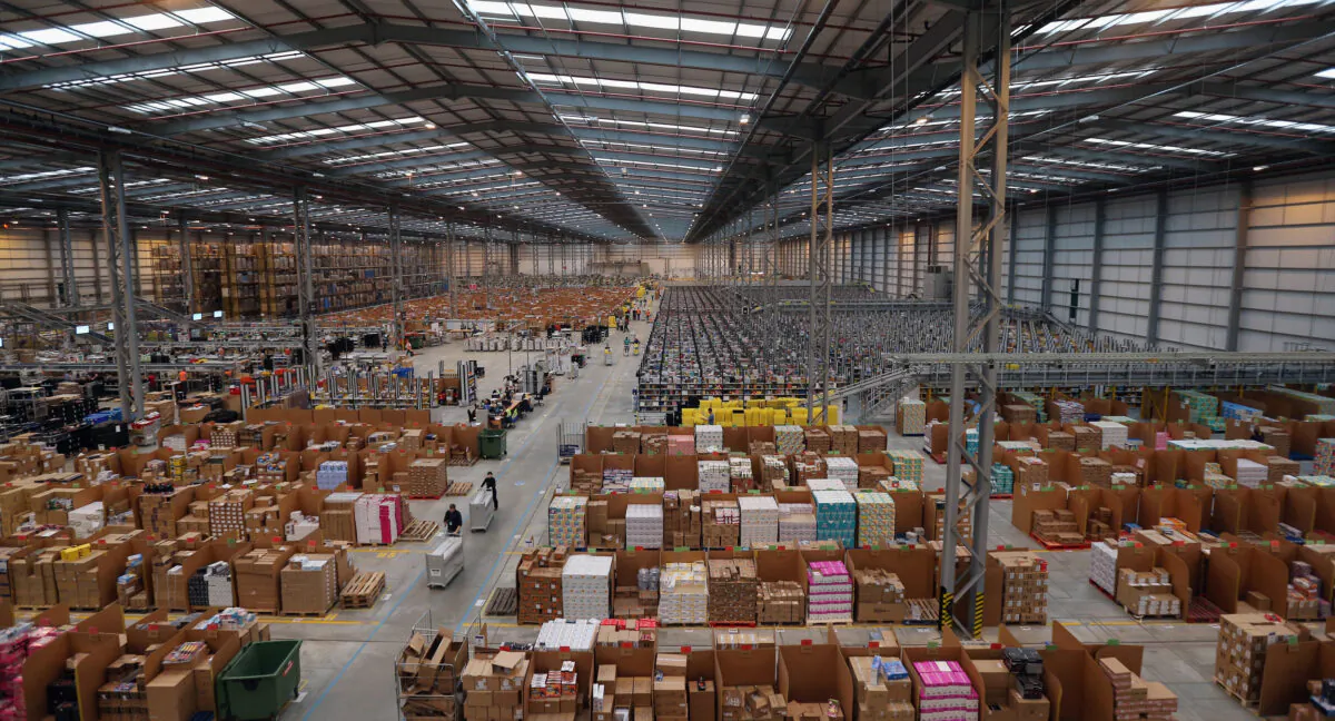 Employees select and dispatch items in the huge Amazon 'fulfillment center' warehouse in Peterborough, England, on Nov. 28, 2013. (Oli Scarff/Getty Images)