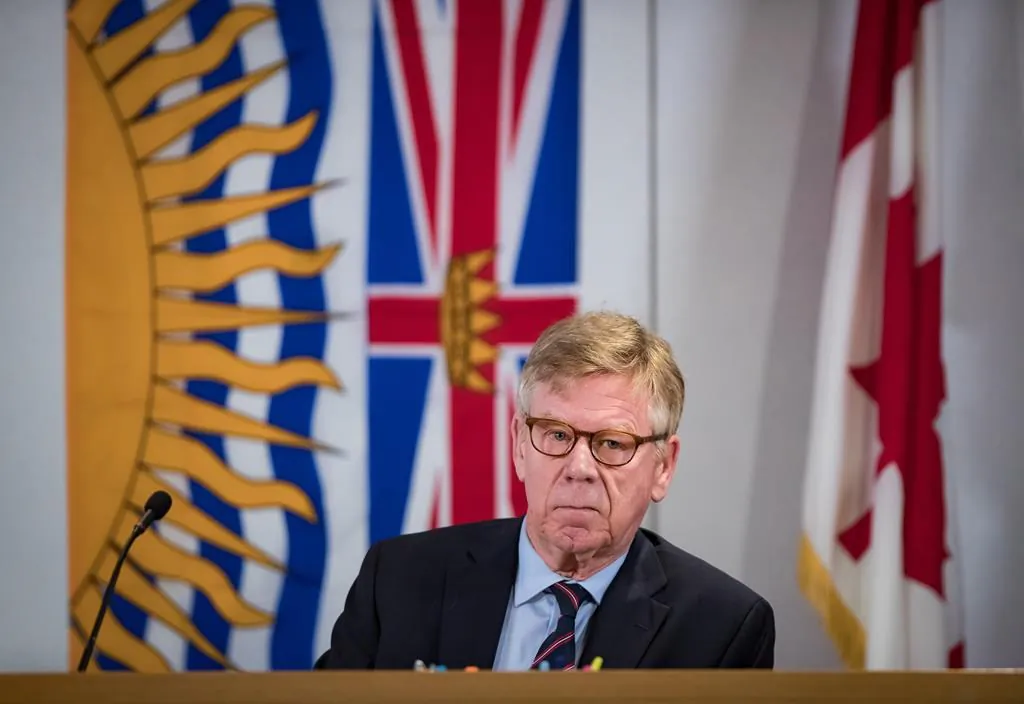 Commissioner Austin Cullen listens to introductions before opening statements at the Cullen Commission of Inquiry into Money Laundering in British Columbia, in Vancouver, on February 24, 2020. (The Canadian Press/Darryl Dyck)