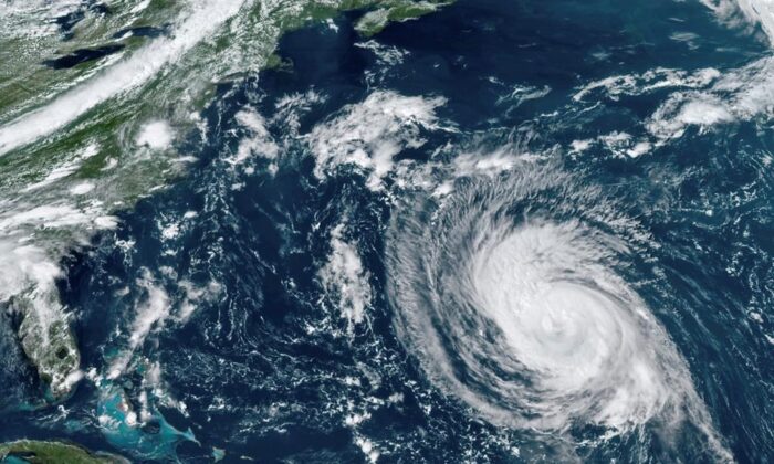 This GOES-16 East GeoColor satellite image was taken at 2:20 pm EDT on September 8, 2021 and provided by NOAA to show the Atlantic hurricane Larry. The National Meteorological Service warns that swells from hurricane rallies cause dangerous rip current conditions.  (Canada Press / NOAA via AP-AP)