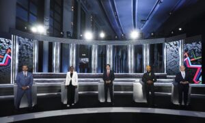 Leaders Trade Barbs on ‘Two Michaels,’ China Human Rights in English Debate