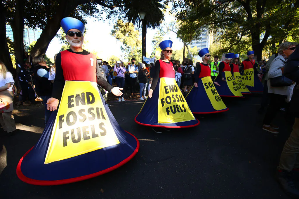 Protesters take part in the School Strike 4 Climate rally in Melbourne, Australia, on May 21, 2021. (Graham Denholm/Getty Images)